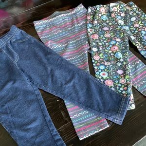 3 leggings all size 2T: zig zags, floral and denim solid